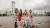 Group of six ECE students pose with the Rotterdam skyline in the background