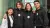 Vier teamleden van de Erasmus Sustainability Hub poseren lachend