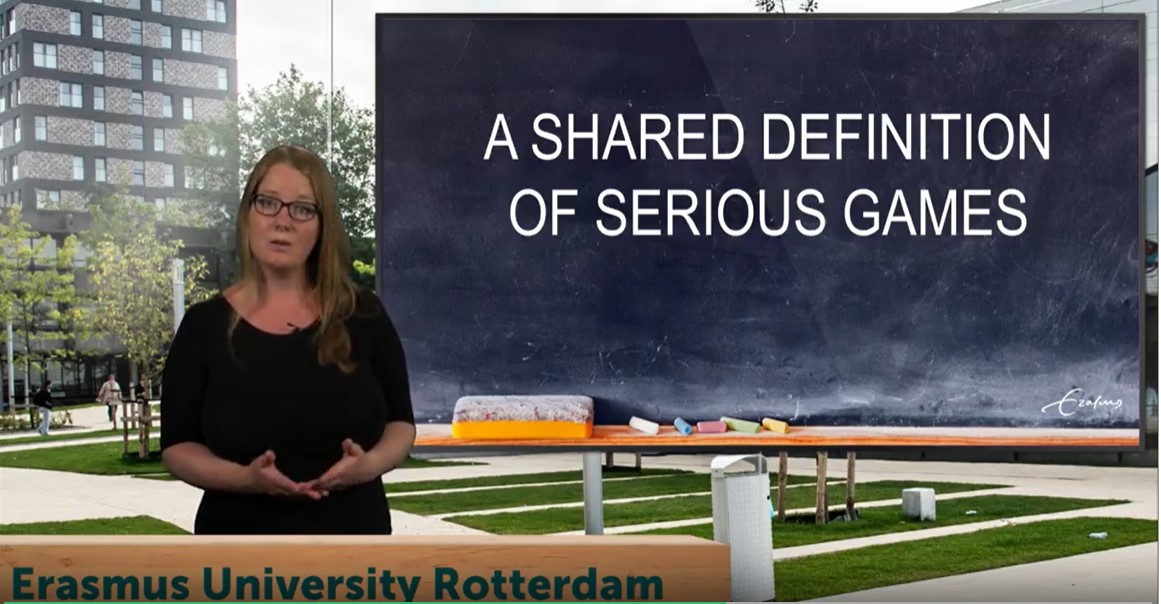 MOOC with Mijke Slot in front of a screen saying: a shared definition of serious games