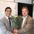 Brian being congratulated by Dean Philip Hans Franses