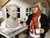 Image of Lia Krol with Tinbergen statue 