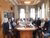 People sitting around table during IcARUS conference in Riga