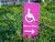 Sign on grass, indicating step free route for wheelchair users