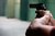 Zoomed in shot of a person holding a revolver
