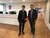 Alumni Helma Maas and Bob van Dillen posing in corridor of Save the Children