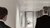 2 men in formal clothing walking towards a room to have a job interview