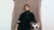 Woman holding football