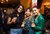 3 women looking at the camera holding drinks