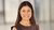Banu Demir smiling at the camera