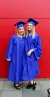 IBCoM alumni Lisanne van Beurden and Mathilde Simon in graduation gowns