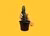 Wooden hand holding a cactus in a pot