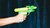 Colorful toy water gun being sprayed