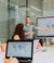 An EUR employee presents in front of a screen