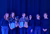 Winners of the Societal Engagement Award stand holding the award together with members of the jury
