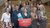 Foto van Laura Kruithof met de 1000e bul Fiscaal Recht