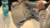 Hands pulling on fabric of a shirt
