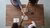 People giving each other a fist bump over a table