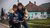 Photo two boys with bike
