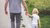 Child and father walking to school