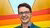Fabian Lips standing in front of a rainbow flag
