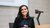 Associate professor Federica Violi poses with a cup of coffee.