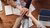 Various hands laying over each other as a team