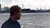 Werner Schouten looking over the water with shipyards in the background