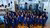 Graduates throwing cap in air