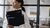 Control, Tax and Finance-professional met een aantal mappen in haar armen