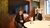 Alumni Helma Maas and Bob van Dillen posing in meeting room at Save the Children