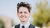 Young man posing for camera in a suit