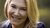 Sydney Ludvigson smiling at the camera