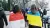 People with Polish and Ukrainian flags