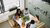 Six people talking at a table