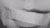 A mouth covered by a plaster