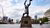 With head and arms raised towards the sky, this sculpture shows a distraught figure