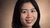 Hong Deng smiling at the camera