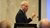 Bert Hofman geeft een lezing.