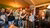 Alumna receives Erasmus School of Economics sweater at Young Alumni Drink
