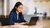 Girl behind laptop
