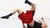 Guy breakdancin gon the ground with legs in the air