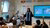 Professor Annelien Bredenoord in toga in front of a primary school class.
