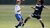 Girls playing football