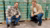 The founders of the drink Mojo Maté pose in front of a large batch of the drinks