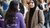 Prospective student in conversation with an ambassador at the information market during the Master Open Day.