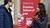 Ambassador talking to a prospective student at the information market during the Master Open Day.