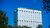 The upper part of the Erasmus MC building surrounded by greenery.
