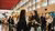 Two prospective students walk around the information market during the Master Open Day.