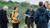 Two researchers explain to residents during the walk in Hoek van Holland.