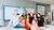 Professor of Economics Otto Swank takes a photo with a group of primary school pupils during Meet the Professor 2024